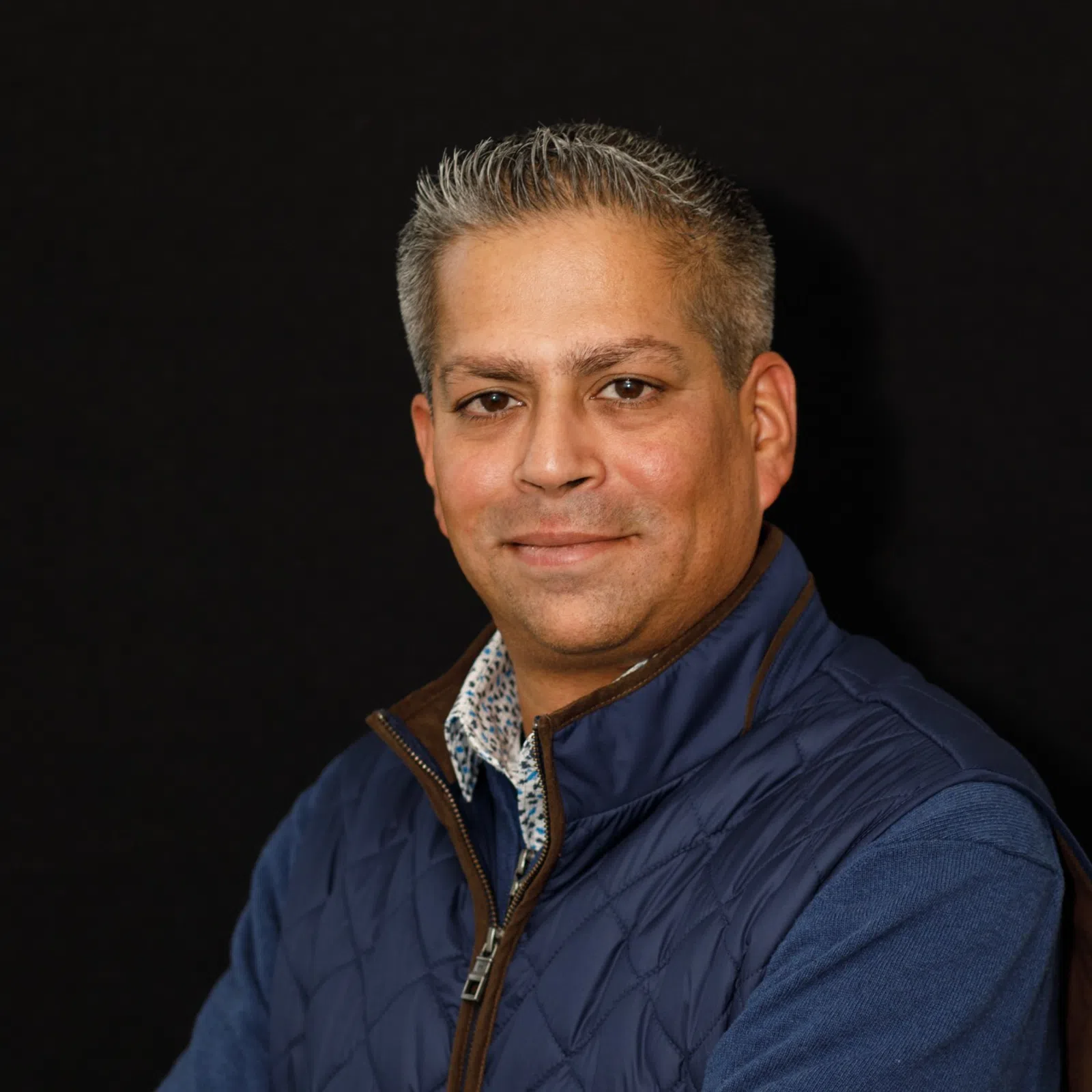 a man in a blue shirt